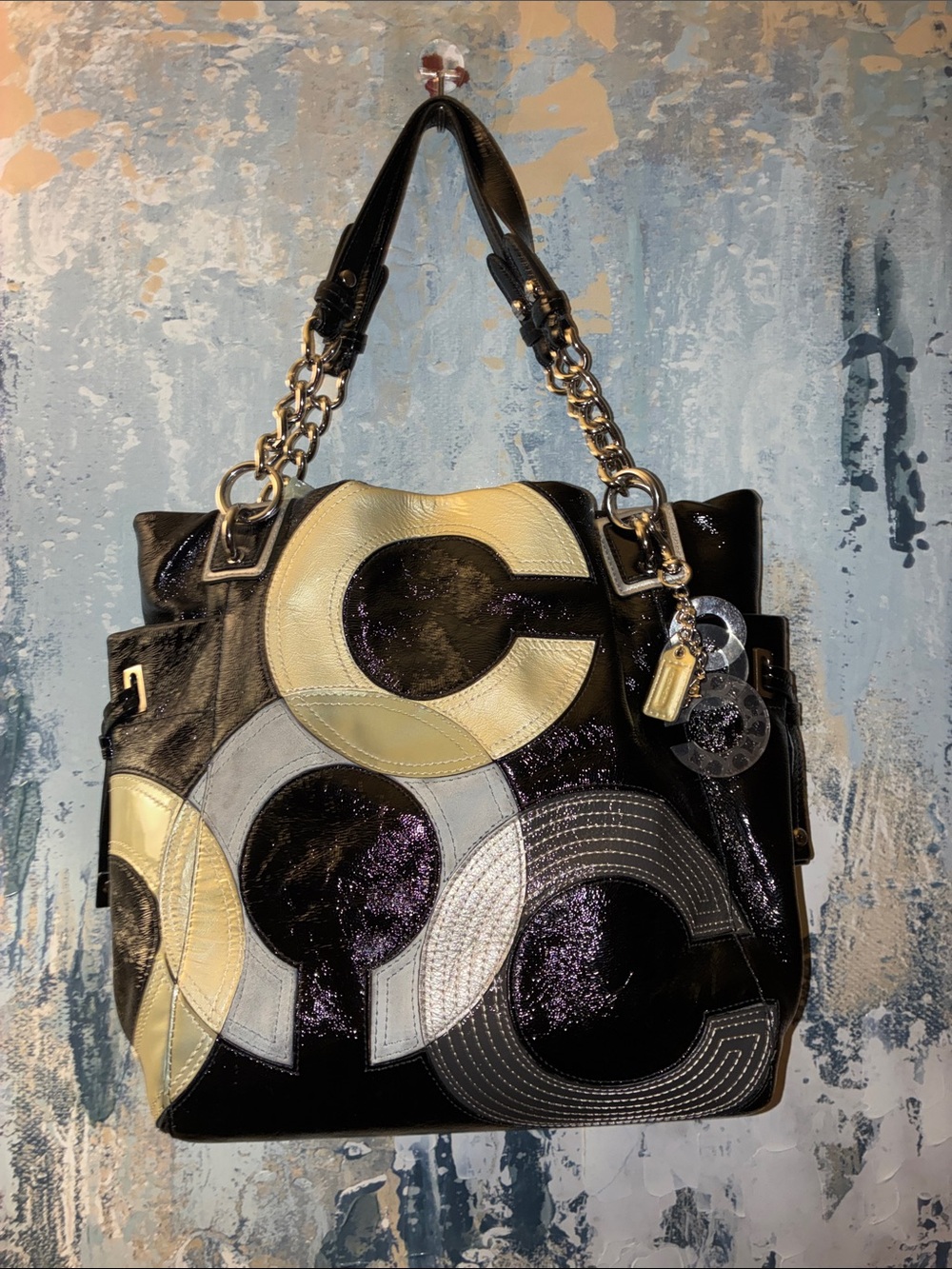 GUC !Coach Black Shoulder Bag with Cream and Gray Circular Inlaid with Charms
